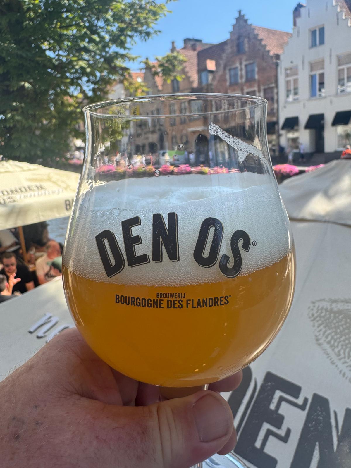 Den Os beer glass on a canal terrace